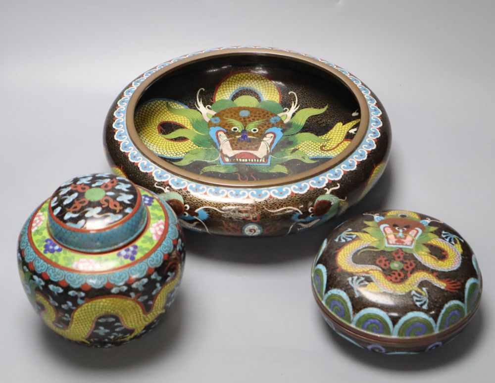 An early 20th century Chinese cloisonne enamel dragon bowl, a similar box and cover and a ginger jar and cover, largest diameter 30cm